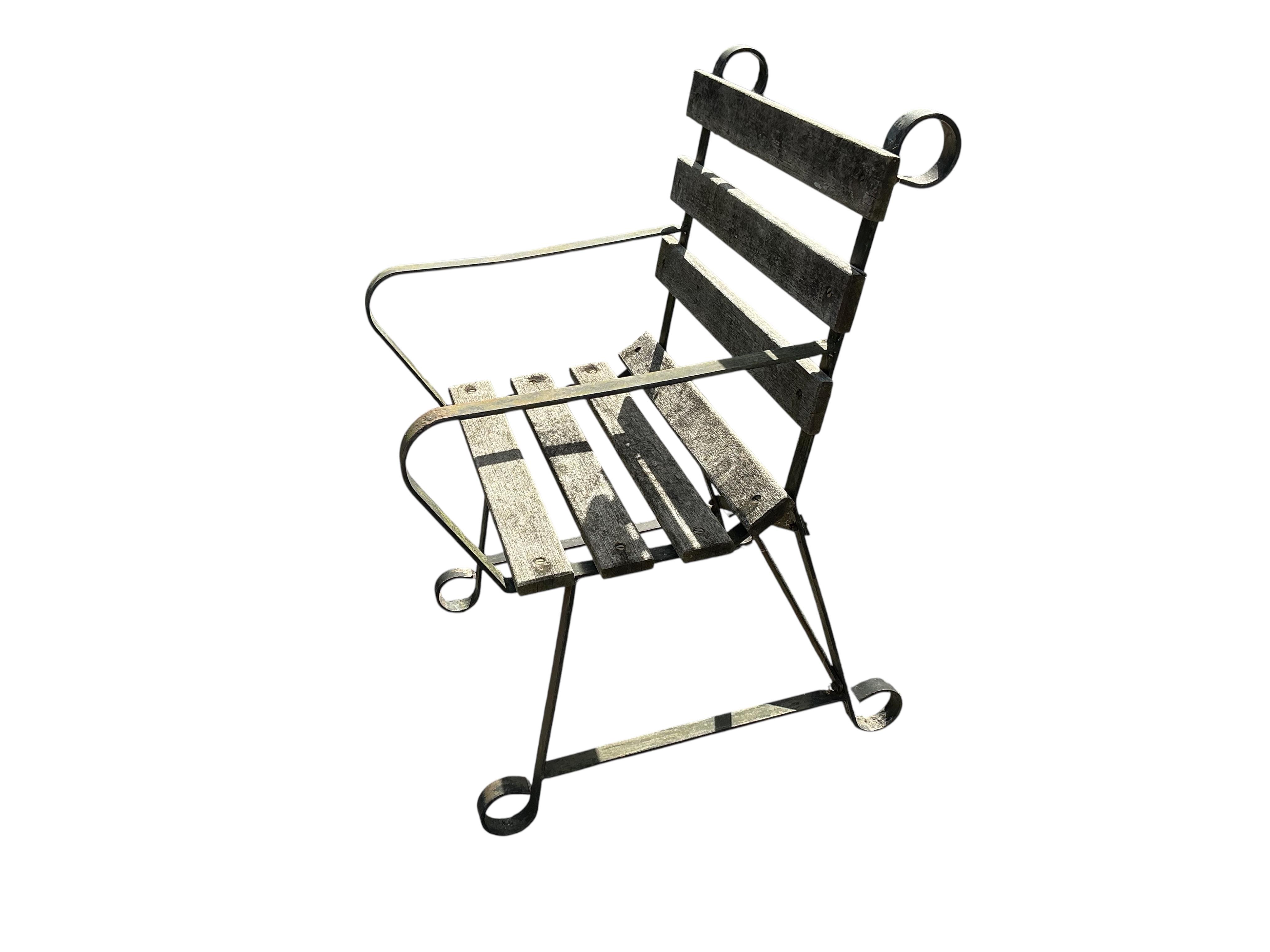Five slatted wrought iron garden chairs, width 60cm, depth 63cm, height 90cm